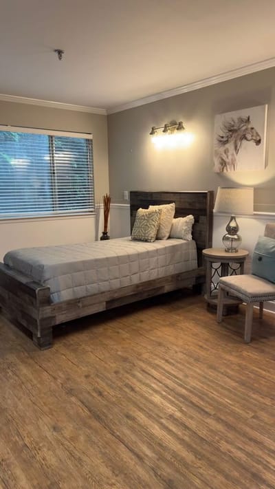 Cozy private resident room with bed and decor