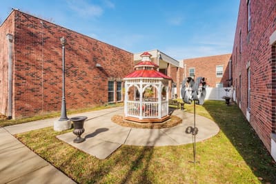 Outdoor gazebo in a landscaped courtyard
