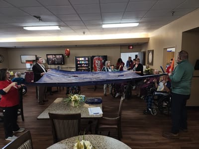 Residents engaged in a group activity in a common area