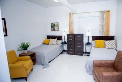 A twin bedroom in an assisted living facility