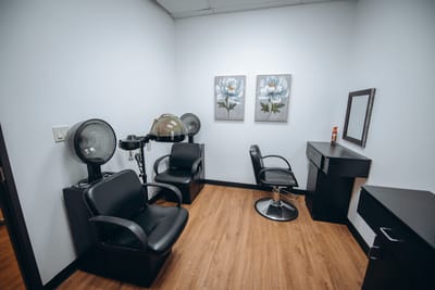 Salon interior with styling chairs and equipment