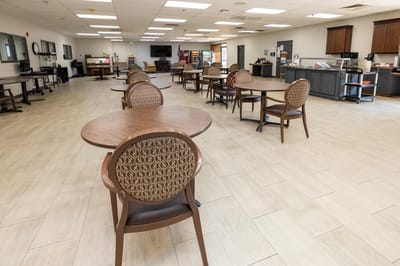 Dining room area with tables and chairs