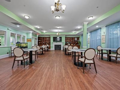 Interior view of a common area with tables and chairs
