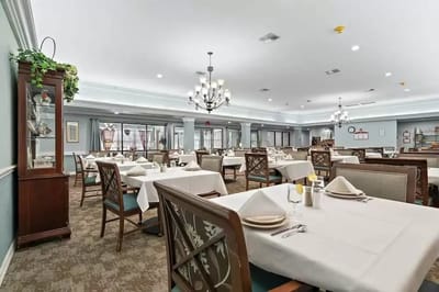 Dining area set up for residents with elegant decor