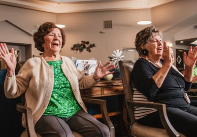 Residents participating in a lively indoor activity