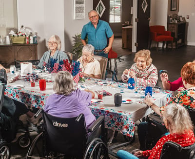 Residents participating in a festive activity at a common area