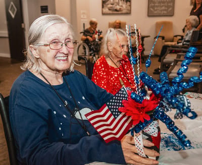 Residents decorating for a festive event in a common area