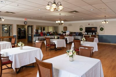 Interior view of a dining area with tables and chairs