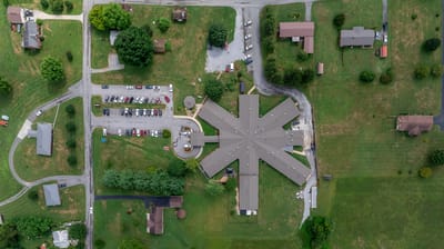 Aerial view of a nursing home facility with grounds