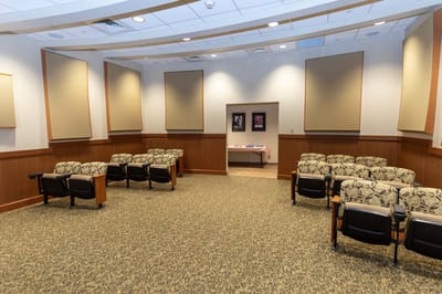 Interior view of a multi-purpose activity room with seating