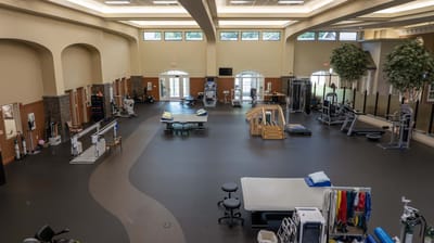 Interior view of a rehabilitation gym with equipment