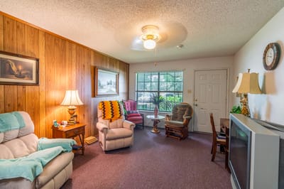 Cozy common area with seating and decor.