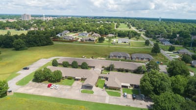 Aerial view of Country Home Estates with surrounding greenery
