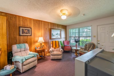 Cozy common area with seating and natural light