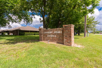 Entrance signage of Country Home Estates