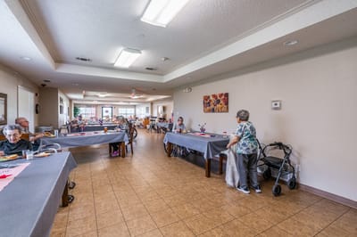 Residents enjoying a meal in the dining room