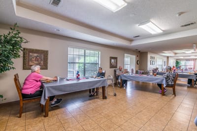 Residents enjoying a meal in a dining area