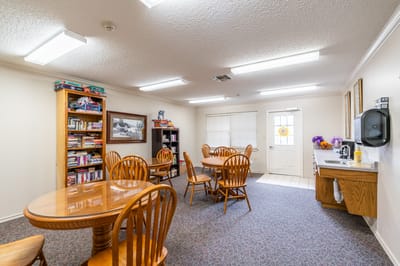 Interior common area with tables and bookshelves