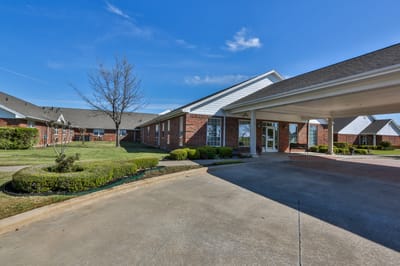 Exterior view of Country Home Estates with landscaped grounds