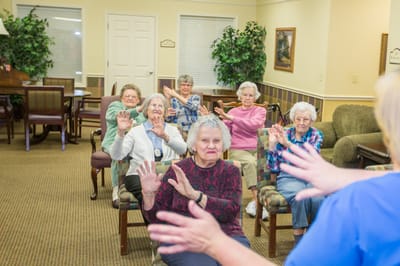 Residents participating in an engaging activity in the common area