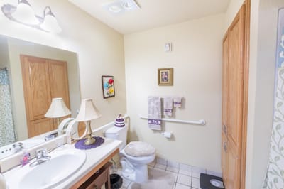 Bright and clean bathroom with amenities