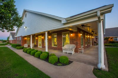 Exterior view of the facility with landscaped garden