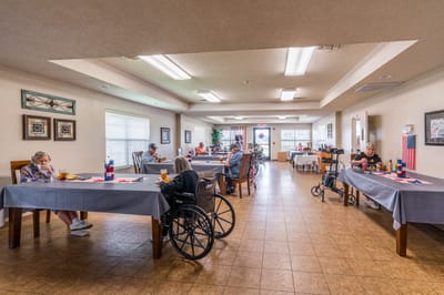 Residents enjoying a meal in the dining area