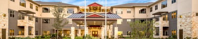 Exterior view of the Village on the Park Plano building