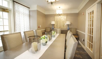 A well-decorated dining area in a senior living facility