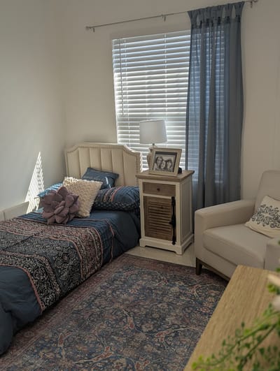 Cozy resident room with bed and decor