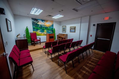 Interior view of a small gathering space with chairs