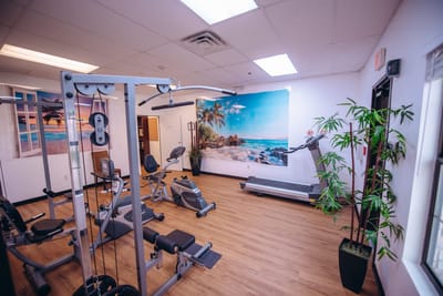 A well-equipped fitness room with exercise machines