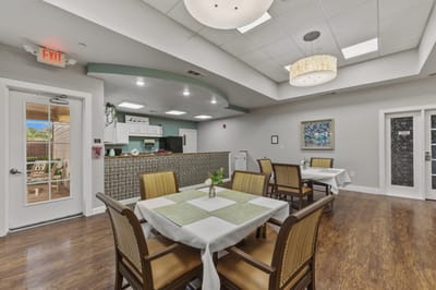 Dining area with tables and chairs set up