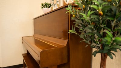 Wooden piano in a cozy interior setting