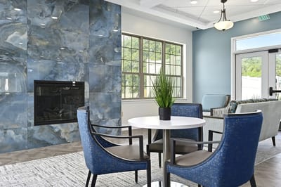 Interior common area with seating and fireplace