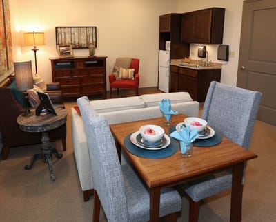 Cozy interior of a resident room with dining area