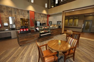 Interior dining area with seating and food display