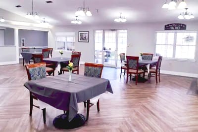 Bright dining area with tables and chairs