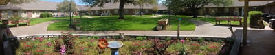 A beautiful garden area with walking paths and seating