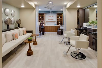 Bright interior of a salon with styling chairs