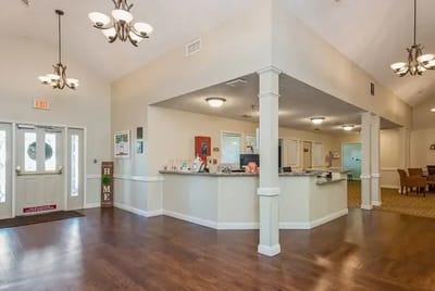 Bright lobby area with seating and reception desk