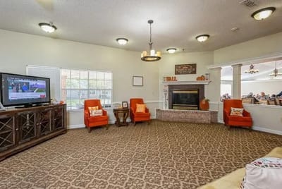 Common area with chairs and television