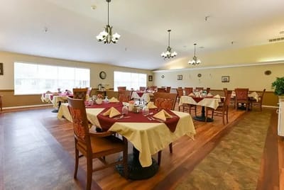 Dining area with tables set for meals