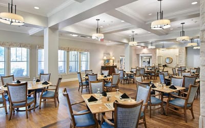 Dining room with tables set for a meal
