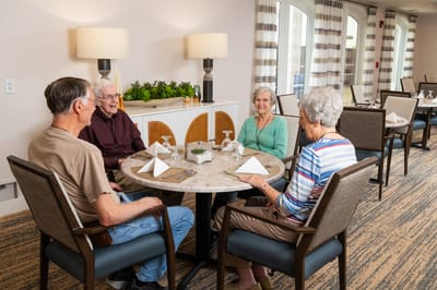 Residents enjoying a meal together in a dining area
