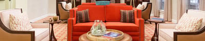 Bright common area with colorful seating and decor
