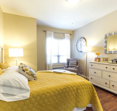 Cozy private resident room with yellow decorations