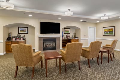 Cozy common area with seating and a fireplace