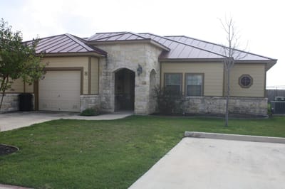 Exterior view of a single-story facility building