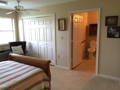 Private resident room with a bed and bathroom